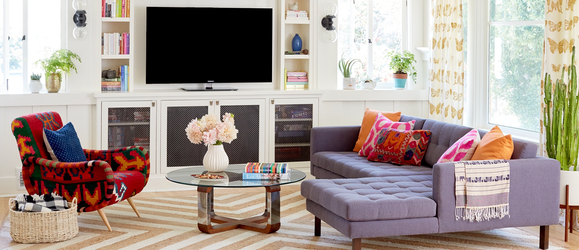 001-echo-park-living-room-hgtv-magazine-feature-anthropologie-kilim-chair-leila-los-angeles-modern-bohemian-bungalow-living-chevron-orange-rug-built-in-media-center-rejuvenation-lighting