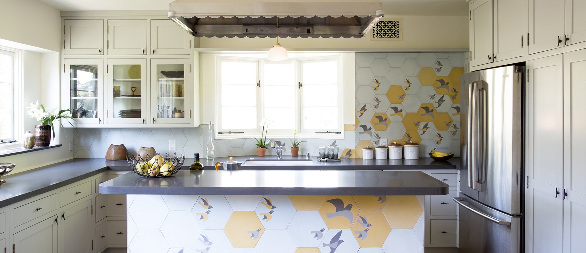 004-panorama-terrace-kitchen-bird-tile-mural-kitchen-island-design-vuelo-cement-hexagon-tile-design-vidal-mystical-journey-collection-custom-hood